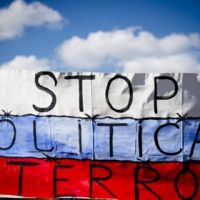 Путин не заметил обращенной к нему акции протеста в Ганновере